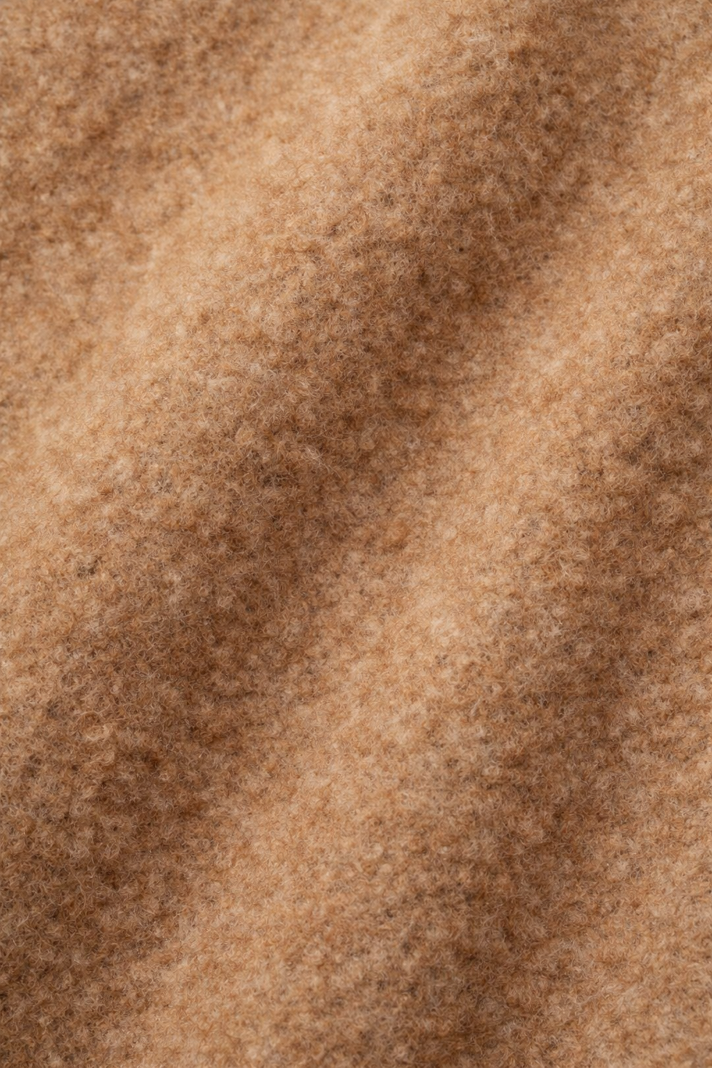 Close-up van de wollook stof van de mantel